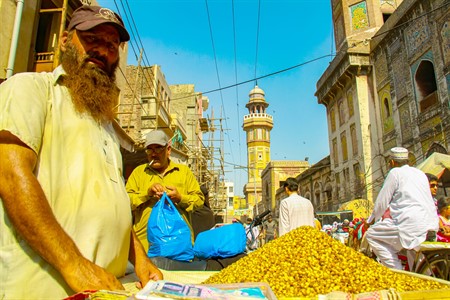 man selling food on cart