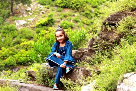 Girl sitting in nature