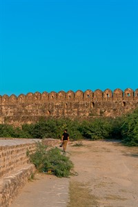 Man walking in Rohtas Fort towards the wall