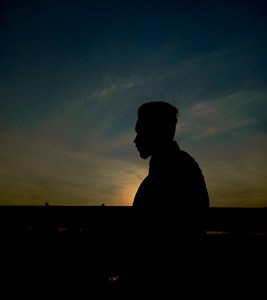  Sunset Photo of man in silhouette