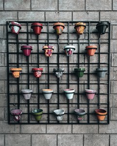 Multi Colour clay pots on wall