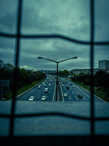 Grand road with dark clouds