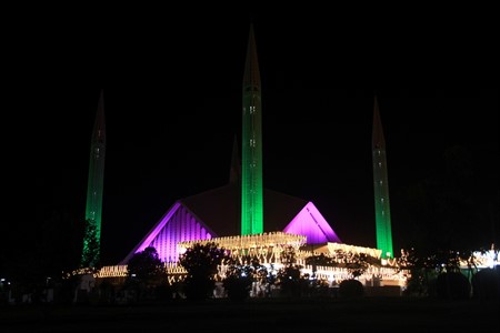 Shah Faisal Mosque decorated with colour full lights. Islamabad