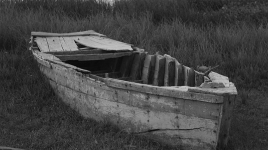 Black and white image of a boat.