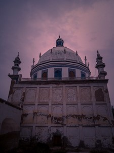 Low angle view of Shrine of peer sheer  against sky at sunset.