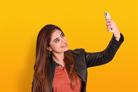 A Young girl with mobile phone