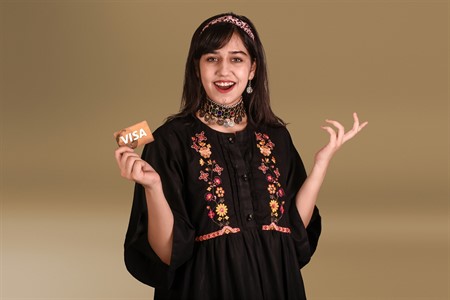 Traditional girl using Credit, Debit VISA card