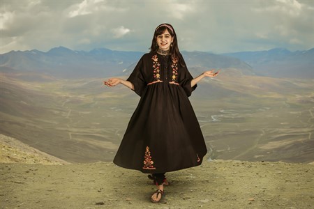 North girl dancing in traditional clothes